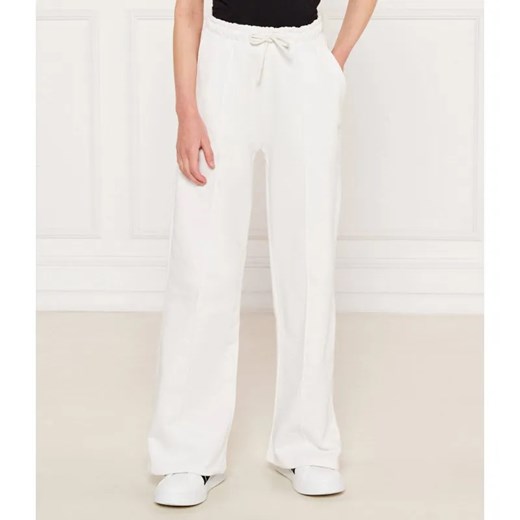 GUESS ACTIVE Spodnie dresowe | Relaxed fit ze sklepu Gomez Fashion Store w kategorii Spodnie dziewczęce - zdjęcie 184297814
