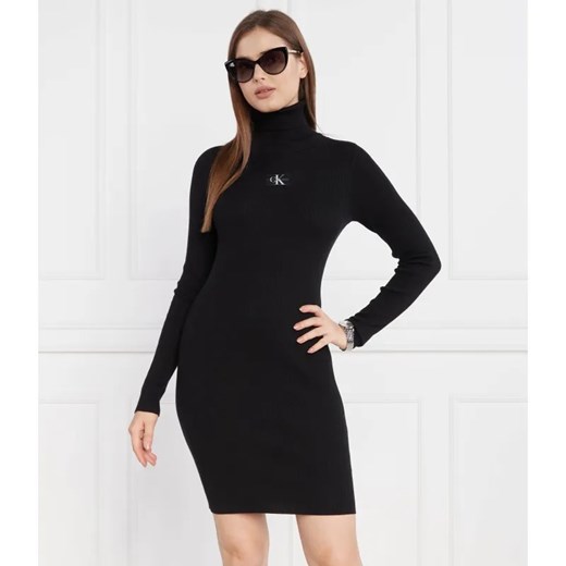 Calvin Klein Jeans Sukienka BADGE ROLL NECK ze sklepu Gomez Fashion Store w kategorii Sukienki - zdjęcie 184331204