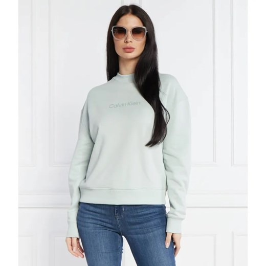 Calvin Klein Bluza HERO LOGO | Regular Fit ze sklepu Gomez Fashion Store w kategorii Bluzy damskie - zdjęcie 184342301