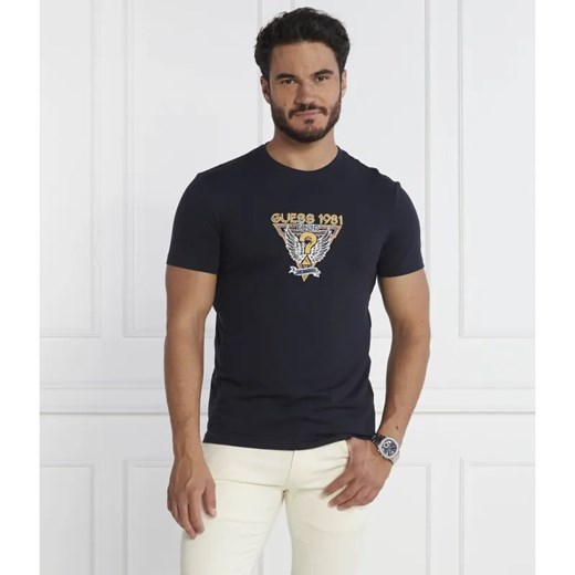 GUESS T-shirt SS CN GUESS WINGS LOGO TEE | Slim Fit ze sklepu Gomez Fashion Store w kategorii T-shirty męskie - zdjęcie 184351142