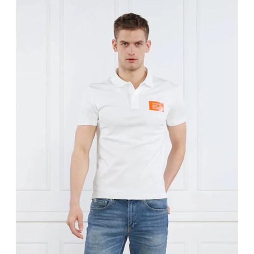 Calvin Klein Jeans Polo COLORED ADDRESS BOX | Regular Fit ze sklepu Gomez Fashion Store w kategorii T-shirty męskie - zdjęcie 184354514
