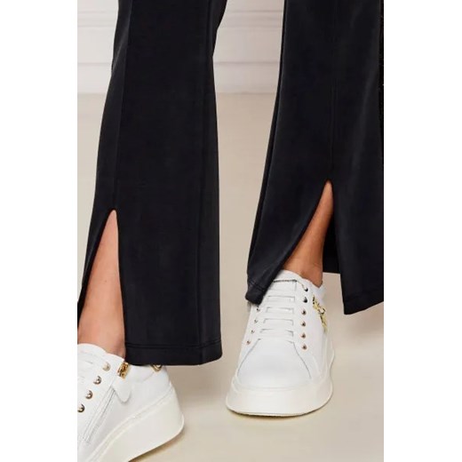 EA7 Spodnie dresowe | flare fit 160 wyprzedaż Gomez Fashion Store