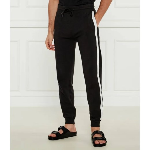 Tommy Hilfiger Spodnie dresowe | Regular Fit ze sklepu Gomez Fashion Store w kategorii Piżamy męskie - zdjęcie 184504660