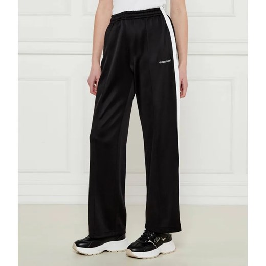 Guess Jeans Spodnie dresowe TRICOT | Relaxed fit ze sklepu Gomez Fashion Store w kategorii Spodnie damskie - zdjęcie 184505200