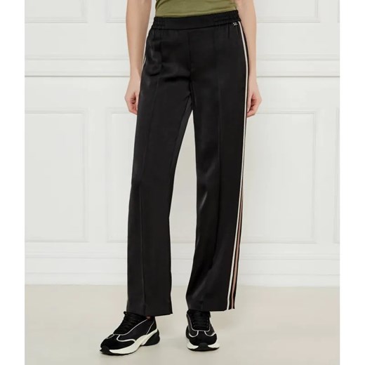 Marc Cain Satynowe spodnie Washington | flare fit ze sklepu Gomez Fashion Store w kategorii Spodnie damskie - zdjęcie 184506374