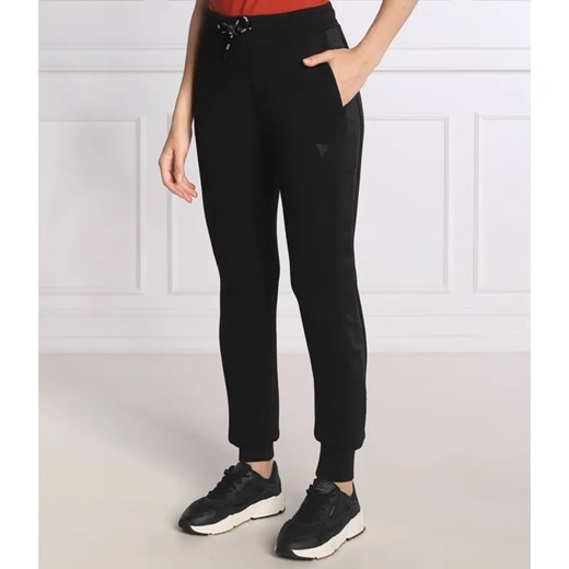 GUESS ACTIVE Spodnie dresowe ALLIE | Regular Fit ze sklepu Gomez Fashion Store w kategorii Spodnie damskie - zdjęcie 184507153