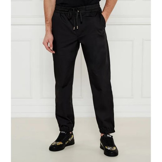 Versace Jeans Couture Spodnie jogger | Regular Fit ze sklepu Gomez Fashion Store w kategorii Spodnie męskie - zdjęcie 184509652