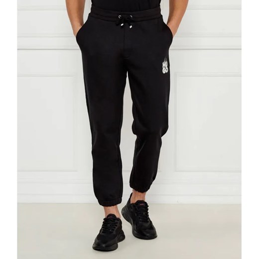 HUGO Spodnie dresowe Dilbero | Relaxed fit ze sklepu Gomez Fashion Store w kategorii Spodnie męskie - zdjęcie 184511342
