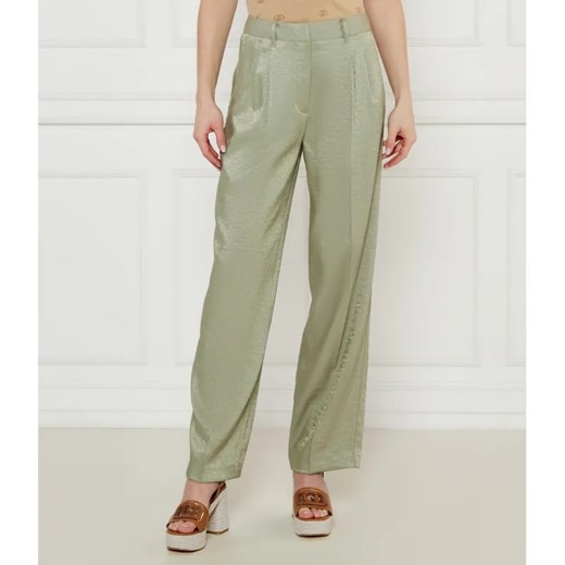 GUESS Spodnie CAMILLE | flare fit ze sklepu Gomez Fashion Store w kategorii Spodnie damskie - zdjęcie 184511602