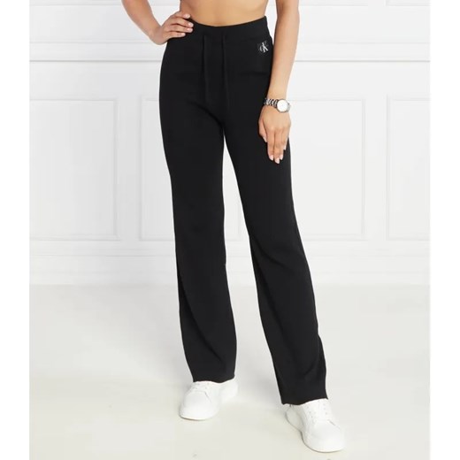 Calvin Klein Jeans Spodnie dresowe STRAIGHT KNITTED | Regular Fit ze sklepu Gomez Fashion Store w kategorii Spodnie damskie - zdjęcie 184512513
