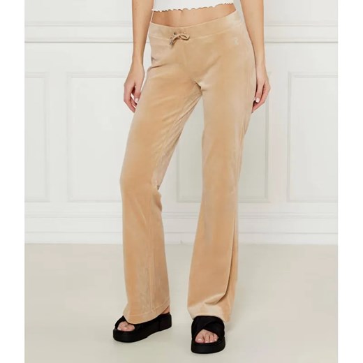 Juicy Couture Spodnie dresowe CHRISTINE | flare fit | low rise ze sklepu Gomez Fashion Store w kategorii Spodnie damskie - zdjęcie 184512753