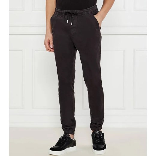 Tommy Jeans Spodnie jogger AUSTIN | Regular Fit ze sklepu Gomez Fashion Store w kategorii Spodnie męskie - zdjęcie 184512803