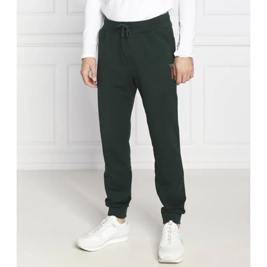 GUESS Spodnie dresowe Adam | Regular Fit ze sklepu Gomez Fashion Store w kategorii Spodnie męskie - zdjęcie 184512840