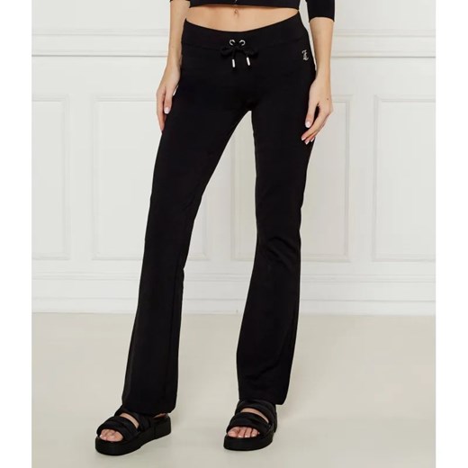 Juicy Couture Spodnie dresowe APOLLO | flare fit | low rise ze sklepu Gomez Fashion Store w kategorii Spodnie damskie - zdjęcie 184512940
