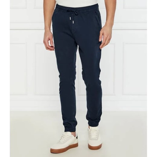 Tommy Jeans Spodnie jogger AUSTIN | Regular Fit ze sklepu Gomez Fashion Store w kategorii Spodnie męskie - zdjęcie 184513014