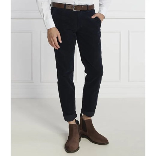 Tommy Hilfiger Spodnie chino BLEECKER CHINO CORDUROY GMD | Slim Fit ze sklepu Gomez Fashion Store w kategorii Spodnie męskie - zdjęcie 184513700