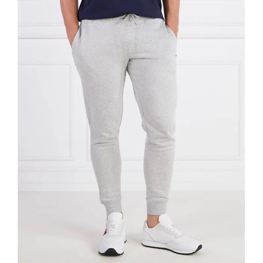 Tommy Jeans Spodnie dresowe TJM SLIM FLEECE SWEA | Slim Fit ze sklepu Gomez Fashion Store w kategorii Spodnie męskie - zdjęcie 184514402