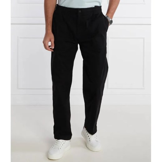 Calvin Klein Jeans Spodnie BADGE TRIM WOVEN PANT | Regular Fit ze sklepu Gomez Fashion Store w kategorii Spodnie męskie - zdjęcie 184515090