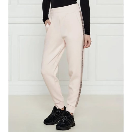 GUESS Spodnie dresowe VICTOIRE | Regular Fit ze sklepu Gomez Fashion Store w kategorii Spodnie damskie - zdjęcie 184516330