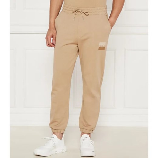 HUGO Spodnie dresowe Dusplitan | Loose fit ze sklepu Gomez Fashion Store w kategorii Spodnie męskie - zdjęcie 184516483