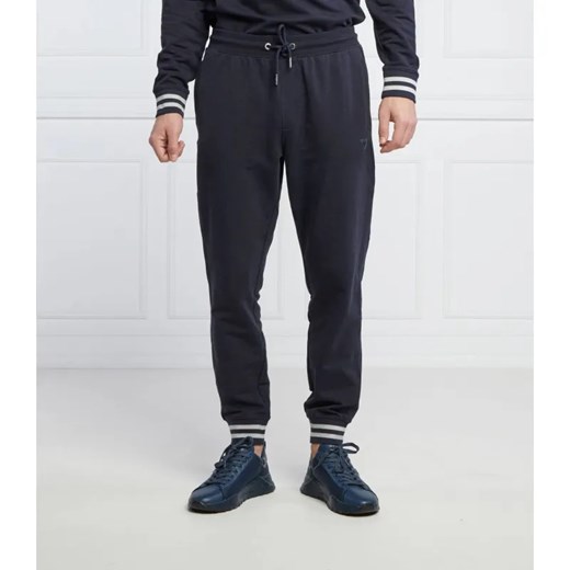 GUESS Spodnie dresowe Adam | Relaxed fit ze sklepu Gomez Fashion Store w kategorii Spodnie męskie - zdjęcie 184517590