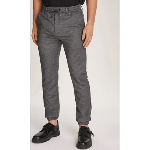 Calvin Klein Spodnie | Regular Fit | z dodatkiem wełny ze sklepu Gomez Fashion Store w kategorii Spodnie męskie - zdjęcie 184517803