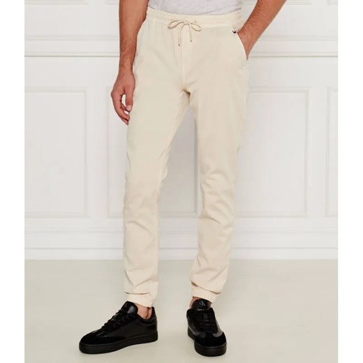 Tommy Jeans Spodnie jogger TJM AUSTIN | Slim Fit ze sklepu Gomez Fashion Store w kategorii Spodnie męskie - zdjęcie 184519520