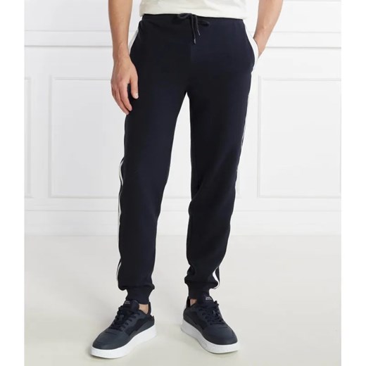 Tommy Hilfiger Spodnie dresowe | Regular Fit ze sklepu Gomez Fashion Store w kategorii Spodnie męskie - zdjęcie 184520071