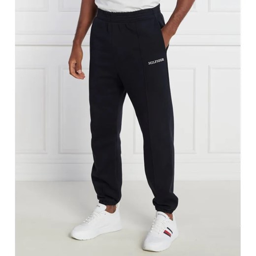 Tommy Hilfiger Spodnie dresowe MONOTYPE EMBRO SWEATPANT | Regular Fit ze sklepu Gomez Fashion Store w kategorii Spodnie męskie - zdjęcie 184520074