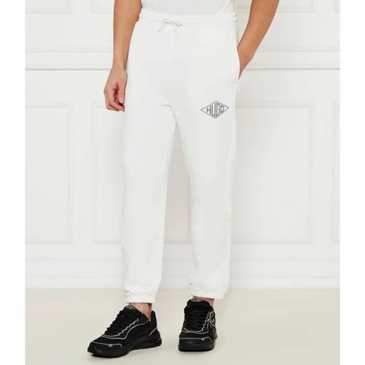 HUGO Spodnie dresowe Dacusi | Loose fit ze sklepu Gomez Fashion Store w kategorii Spodnie męskie - zdjęcie 184521892