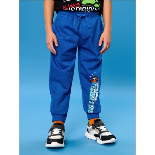 Sinsay - Spodnie dresowe Among Us - mid blue ze sklepu Sinsay w kategorii Spodnie chłopięce - zdjęcie 184525450