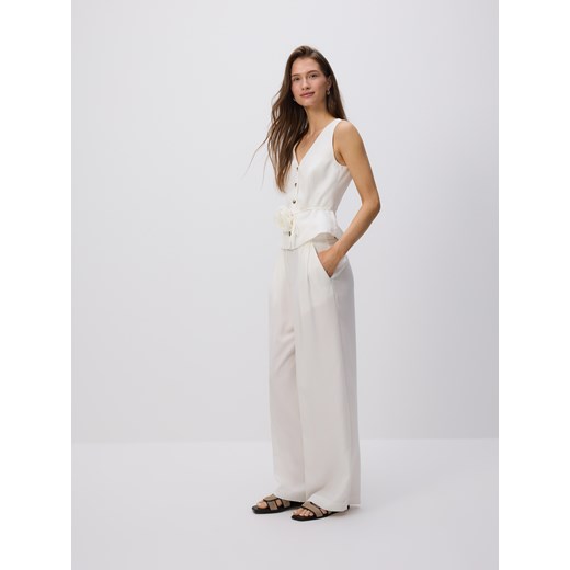 Reserved - Spodnie z lyocellem - złamana biel Reserved XS Reserved