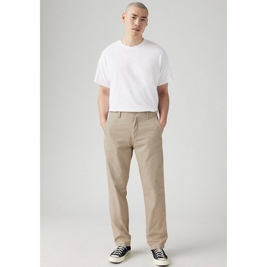 Levi&apos;s Spodnie chino w kolorze beżowym ze sklepu Limango Polska w kategorii Spodnie męskie - zdjęcie 184559570