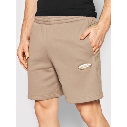 adidas Szorty sportowe R.Y.V. Basic Essential HC9460 Beżowy Regular Fit ze sklepu MODIVO w kategorii Spodenki męskie - zdjęcie 184560680