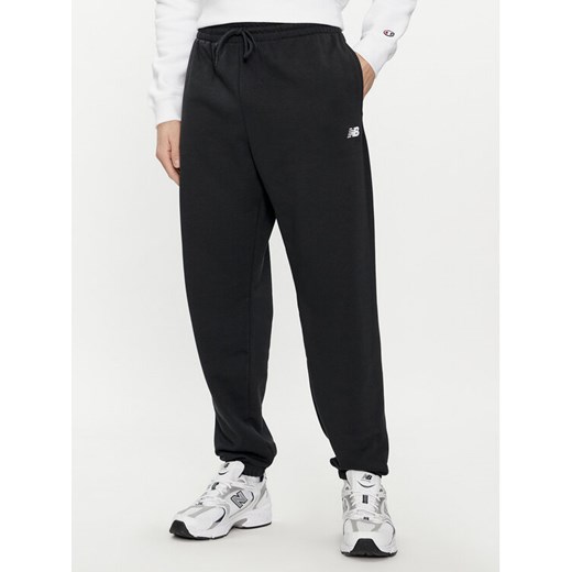 New Balance Spodnie dresowe MP41519 Czarny Relaxed Fit ze sklepu MODIVO w kategorii Spodnie męskie - zdjęcie 184578951