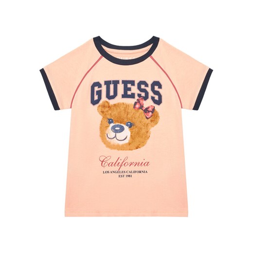 Guess T-Shirt J5YI21 K8HM4 Koralowy Regular Fit ze sklepu MODIVO w kategorii Bluzki dziewczęce - zdjęcie 184591680