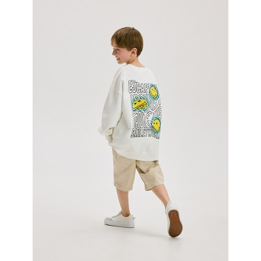 Reserved - Bluza ovesize SmileyWorld - złamana biel ze sklepu Reserved w kategorii Bluzy chłopięce - zdjęcie 184599264