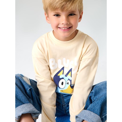 Sinsay - Koszulka z długimi rękawami Bluey - kremowy Sinsay 104 (3-4 l) Sinsay