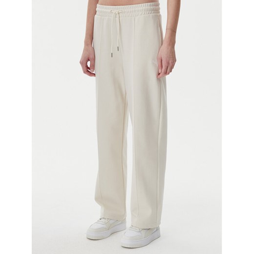 Puma Spodnie dresowe Ess 629774 Beżowy Straight Fit ze sklepu MODIVO w kategorii Spodnie damskie - zdjęcie 184608253