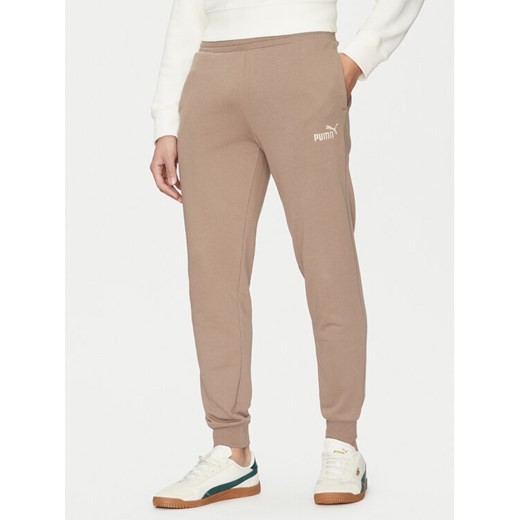 Puma Spodnie dresowe Ess No. 1 Logo 682609 Brązowy Regular Fit ze sklepu MODIVO w kategorii Spodnie męskie - zdjęcie 184608362