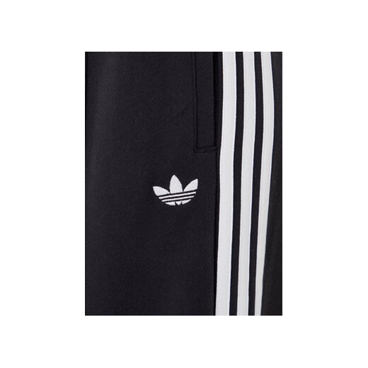 adidas Spodnie dresowe adicolor 3-Stripes JV7473 Czarny Wide Leg M MODIVO