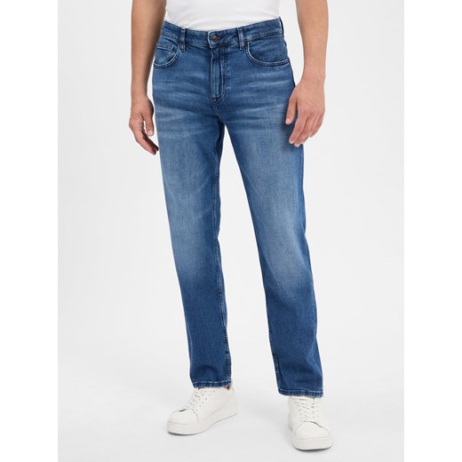 BOSS Orange Dżinsy - Troy Regular Tapered Mężczyźni Bawełna medium stone jednolity ze sklepu vangraaf w kategorii Jeansy męskie - zdjęcie 184655060