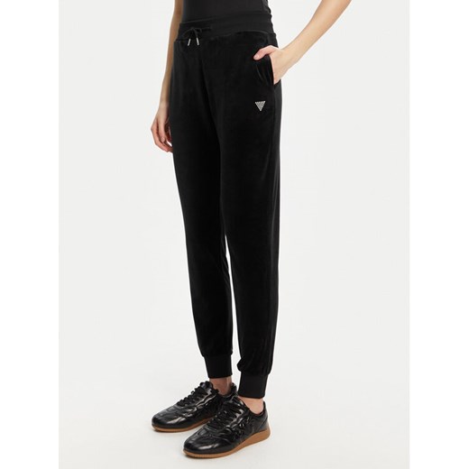 Guess Spodnie dresowe V3BB27 K0232 Czarny Regular Fit ze sklepu MODIVO w kategorii Spodnie damskie - zdjęcie 184657431