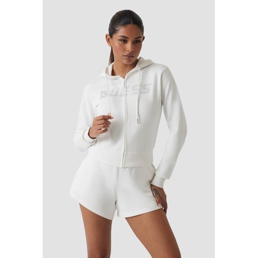 GUESS Biała damska bluza z cyrkoniami Primula, Rozmiar XS ze sklepu outfit.pl w kategorii Bluzy damskie - zdjęcie 184661940