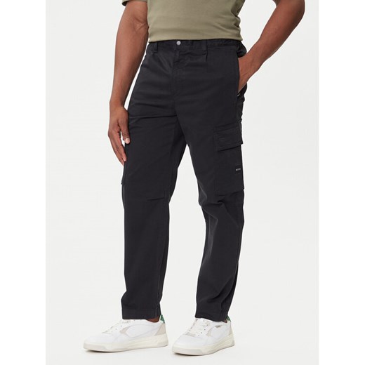 BOSS Spodnie materiałowe Sisla-9 50544866 Czarny Regular Fit ze sklepu MODIVO w kategorii Spodnie męskie - zdjęcie 184706773