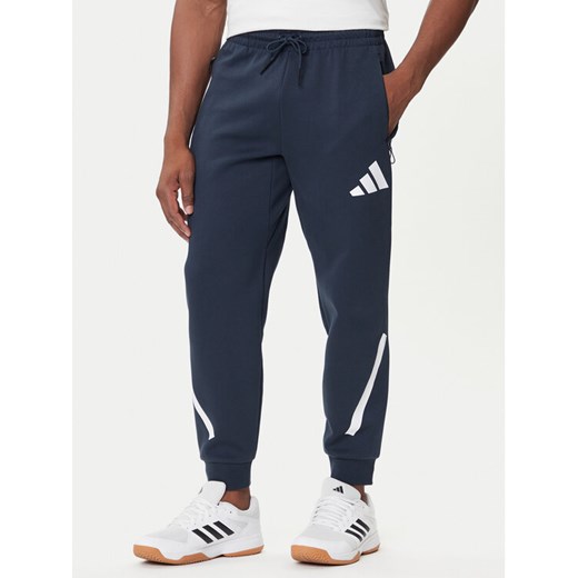 adidas Spodnie dresowe Z.N.E. JW4723 Granatowy Loose Fit ze sklepu MODIVO w kategorii Spodnie męskie - zdjęcie 184706901
