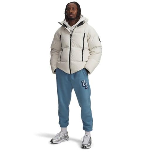 Męskie spodnie dresowe joggery Under Armour UA Icon Flc Graphic - niebieskie ze sklepu Sportstylestory.com w kategorii Spodnie męskie - zdjęcie 184721914