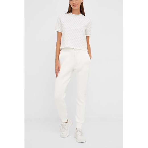 GUESS Beżowe spodnie dresowe damskie Allie Scuba, Rozmiar XS Guess  outfit.pl okazyjna cena