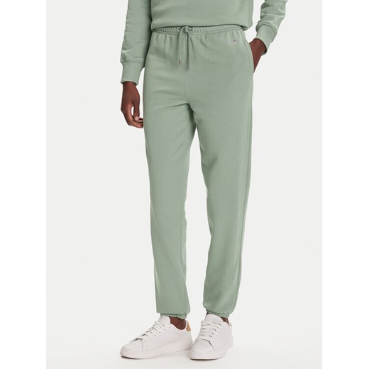 Gant Spodnie dresowe Shield 4200500 Zielony Regular Fit ze sklepu MODIVO w kategorii Spodnie damskie - zdjęcie 184738852