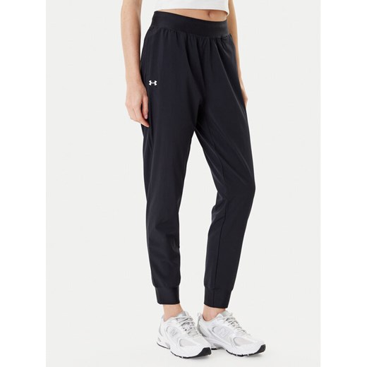 Under Armour Spodnie dresowe Armoursport High Rise Wvn Pnt 1382727-001 Czarny Loose Fit ze sklepu MODIVO w kategorii Spodnie damskie - zdjęcie 184761942